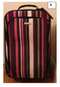 Pink striped bag will be easy to see in the luggage carousel
