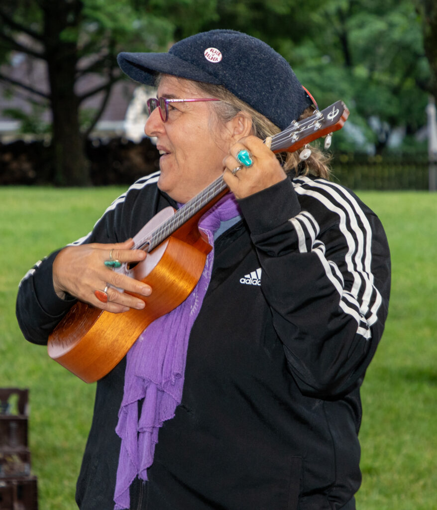 A woman with a ukelele.